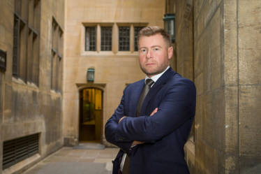 Portrait photo of Damien Moore MP